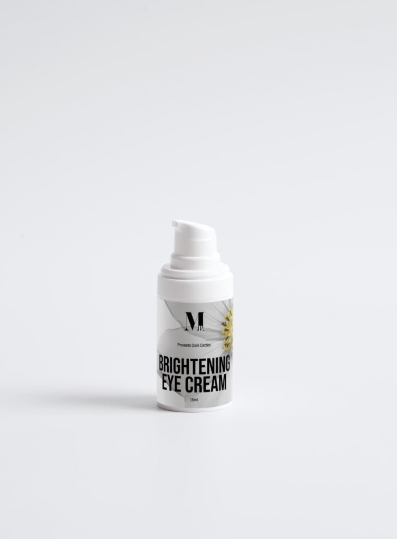 White eye cream bottle with black text on a light gray background
