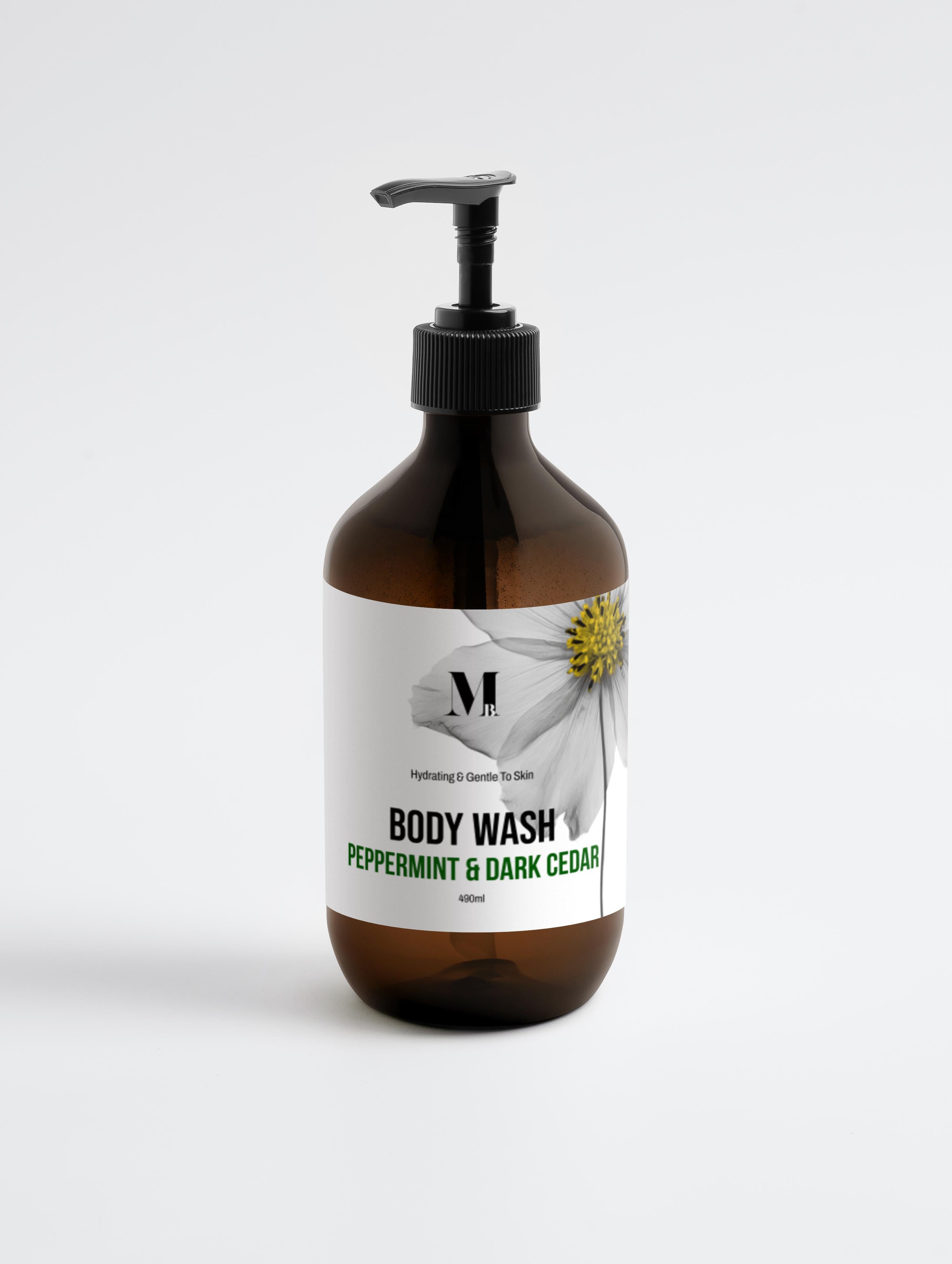 Body wash bottle with pump labeled 'Peppermint & Dark Cedar' on a white background