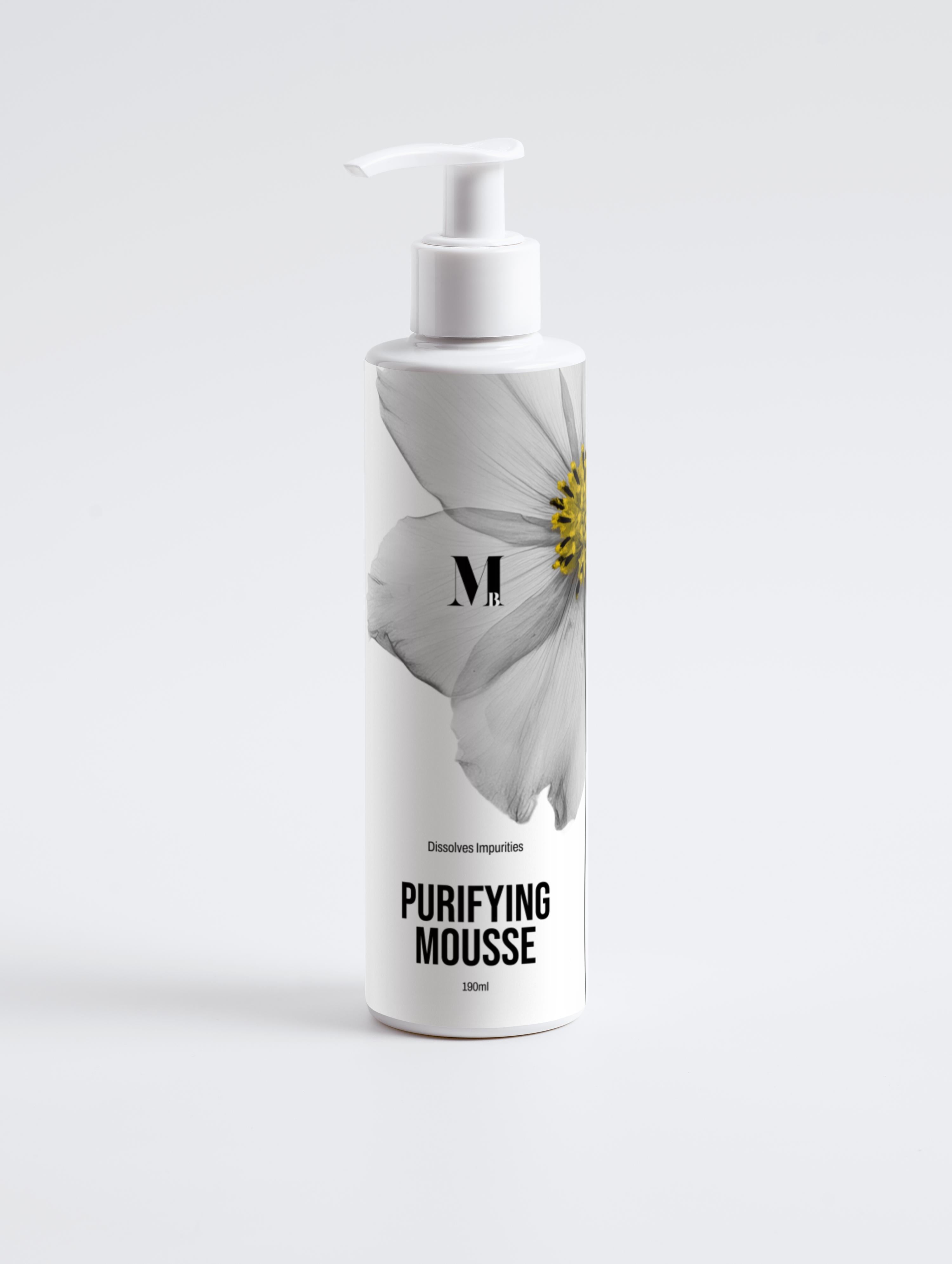 Bottle of purifying mousse with a floral design on a white background