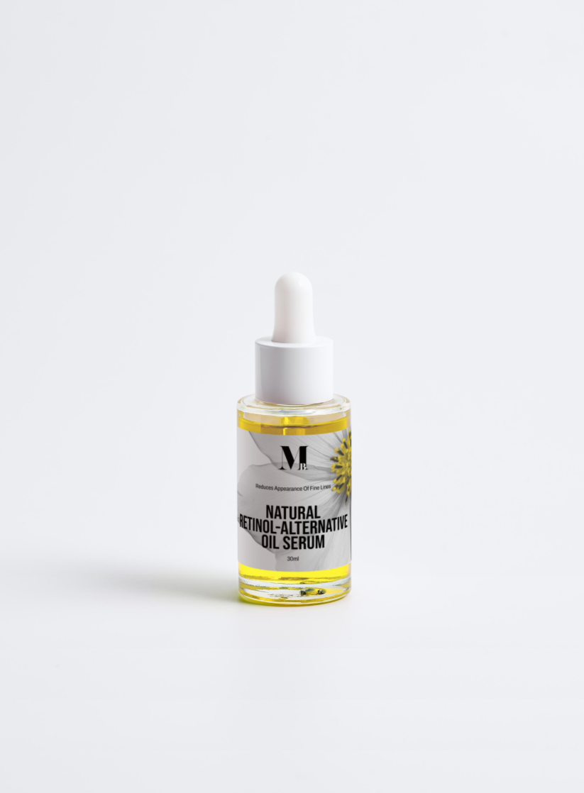 Bottle of natural metronidazole alternative oil serum on a white background